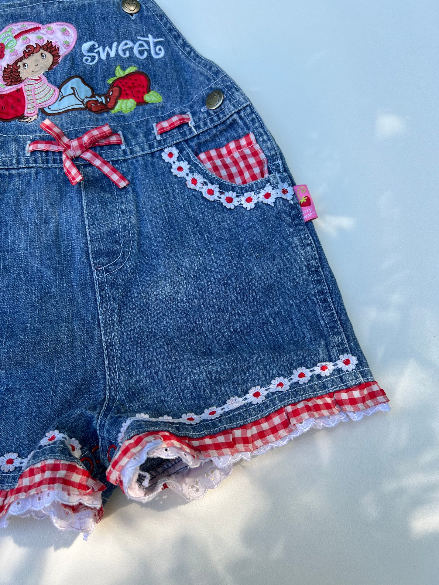 2000’s Strawberry Shortcake Overalls 18M (RESERVED)